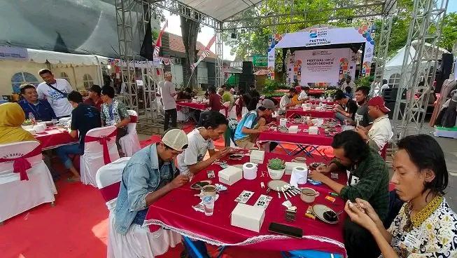 Foto: Suasana Nglelet Kopi di acara Festival Ngopi Gedhen/palevioletred-jellyfish-458835.hostingersite.com/Sri Lestari